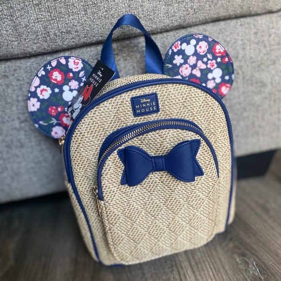 Disney Handbags - Disney Minnie Mouse mini backpack with two pockets and floral printed ears w/bow